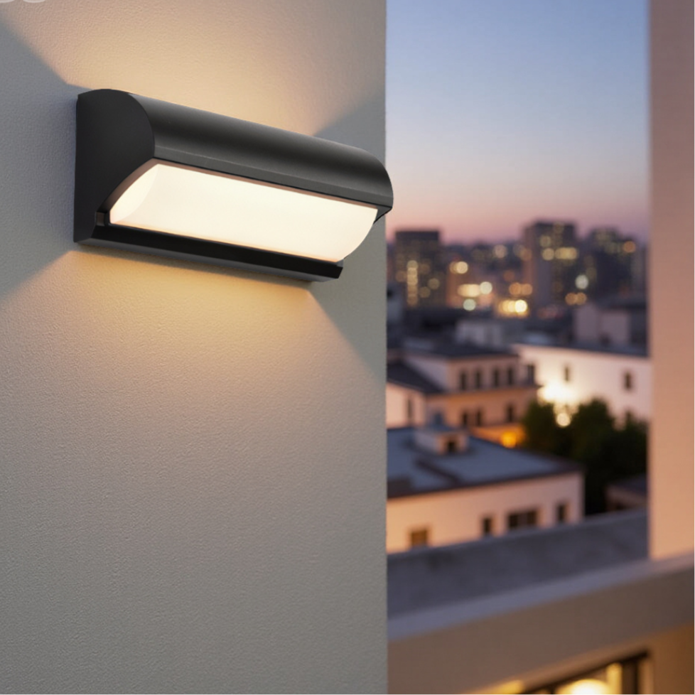 Energy-efficient warm white LED wall light, black & weatherproof for exterior patio, garden, and home illumination.