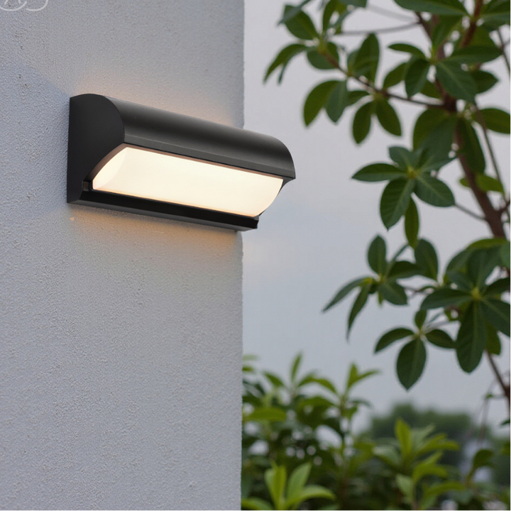 Durable, weatherproof black LED wall light for modern garden, patio, and entryway exterior illumination.