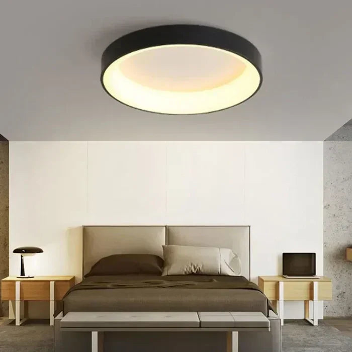 Modern circular LED ceiling light fixture, perfect for minimalist and Scandinavian home decor, providing bright indoor lighting.
