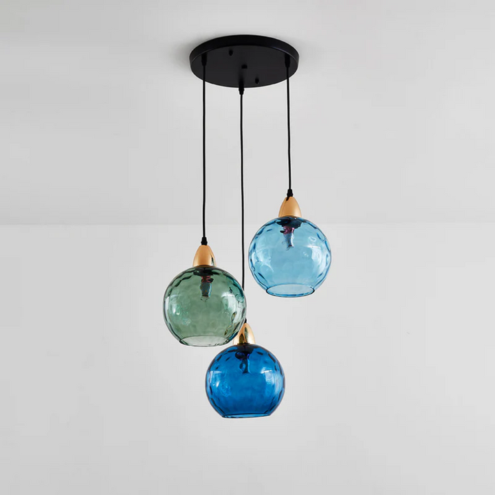 Sleek 3-lamp cluster ceiling lamp, perfect modern lighting for dining room decor.