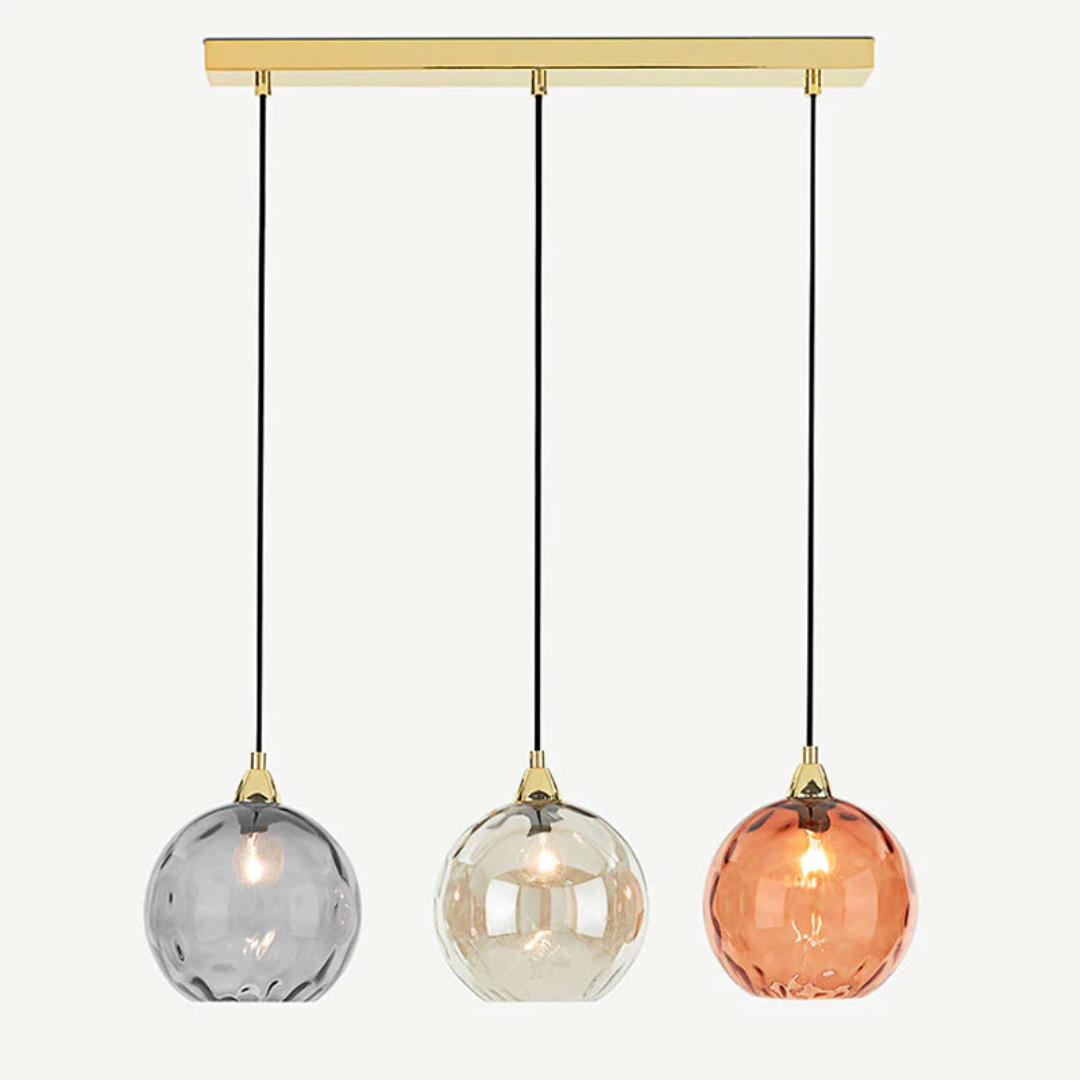 Modern 3-lamp cluster ceiling lamp, perfect ambient lighting for a stylish living room.