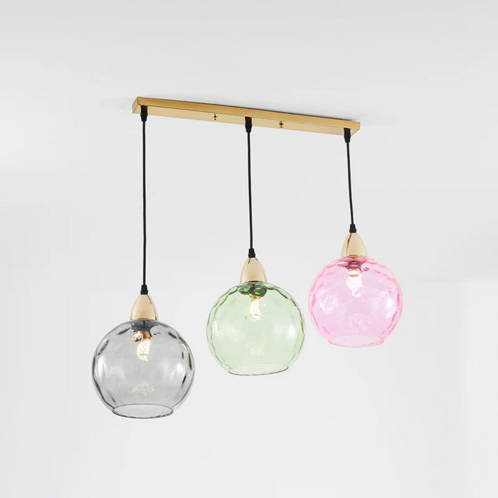Elegant modern cluster pendant light with 3 lamps, a statement piece for interior design.