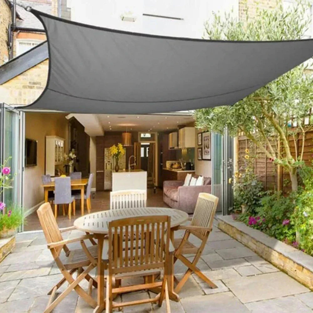 Durable garden canopy shade sail. Modern design for effective sun and UV protection in outdoor living spaces.