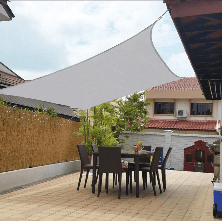 Triangle outdoor shade sail for balcony. Modern, weather resistant, and offers excellent UV sun protection.