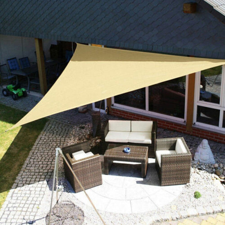 Square patio shade sail cover. Modern design, weather resistant, provides superior sun and UV protection.