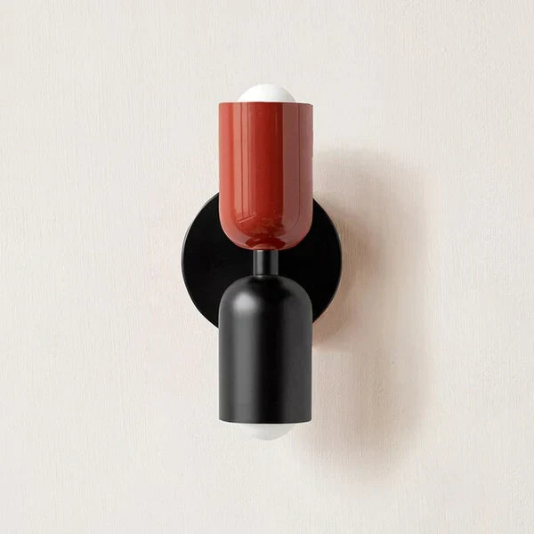 Contemporary LED wall sconce, providing efficient and adjustable light for hallways.
