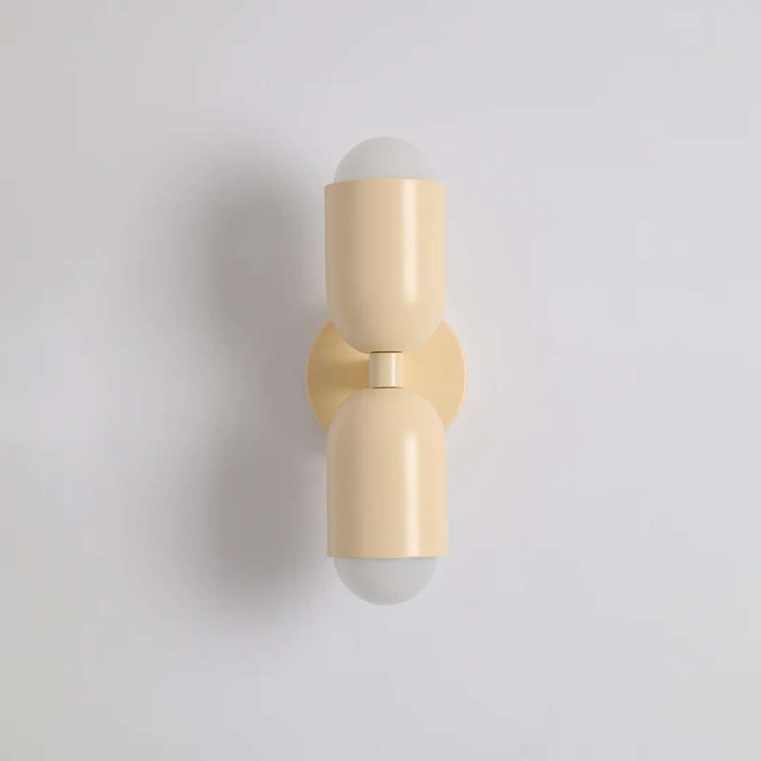 Modern double-sided LED wall lamp creating vibrant ambient lighting, perfect for contemporary home decor.