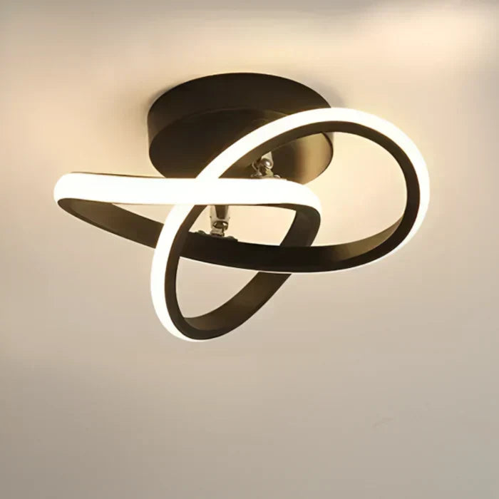 Indoor LED ceiling lamp with a modern, energy-efficient design, warm white light.