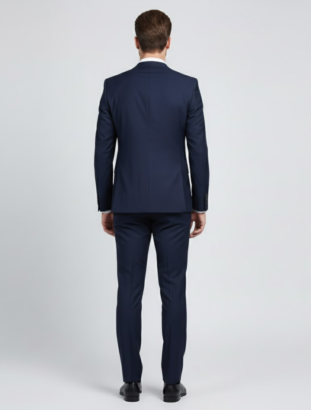 Classic black modern fit men's suit, two-piece tailored for business, formal occasions, and wedding attire.