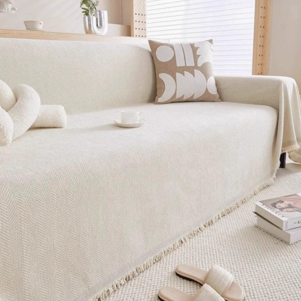 Elegant modern throw blanket, a perfect housewarming gift and versatile furniture protector for any living room couch.