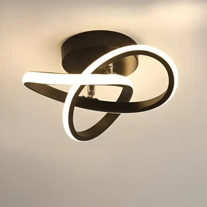 Modern double ring LED ceiling light. Enhances interior design with its clean, contemporary look.