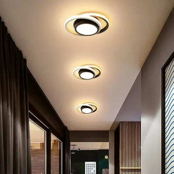 Stylish double ring LED ceiling lamp. Ideal modern lighting for living rooms or hallways.