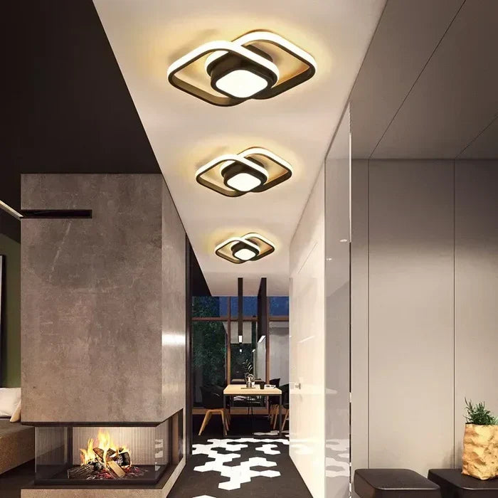 Contemporary LED ceiling lamp featuring an elegant double ring design. Brightens any modern interior.