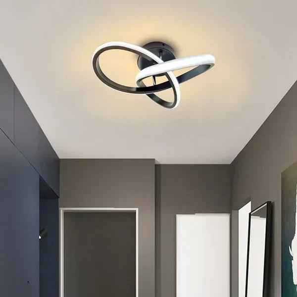 Modern LED ceiling lamp, double ring design. Contemporary light for stylish home decor.
