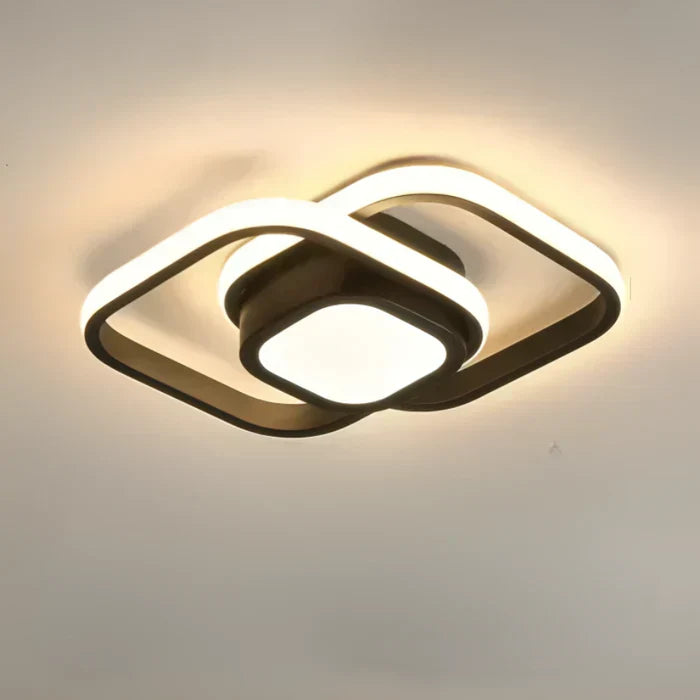 Close-up of modern LED double ring ceiling lamp. High-quality contemporary lighting fixture.