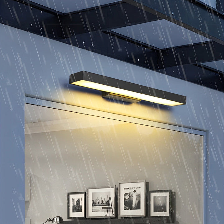 Modern black LED wall lamp, energy-efficient with motion sensor for exterior security lighting.