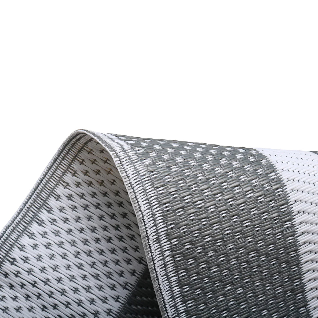 Deck mat: modern gray rectangular outdoor rug, water-resistant & reversible geometric design for patios.
