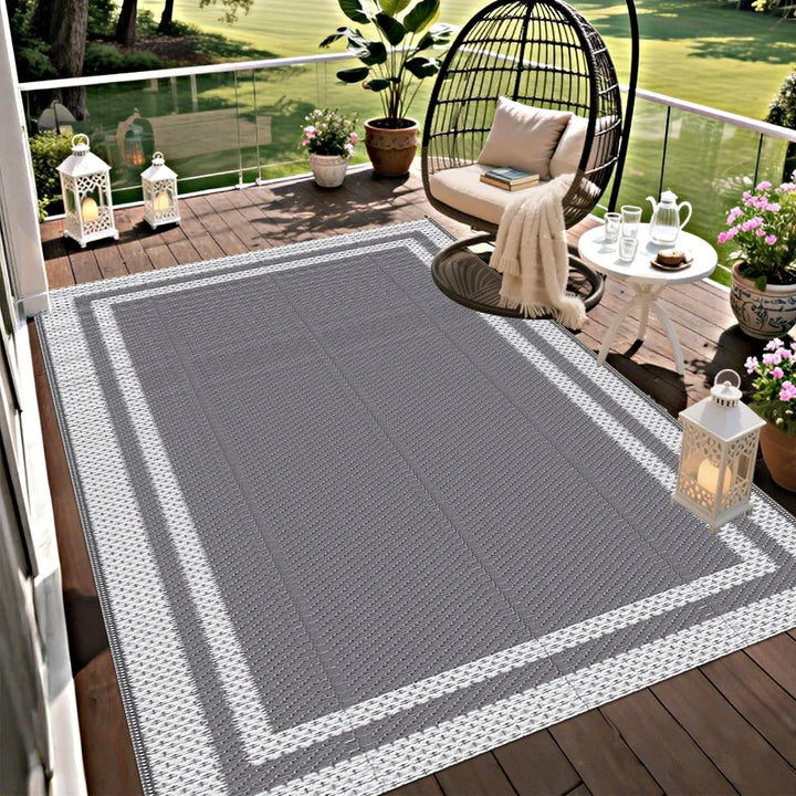 Camping mat: portable modern gray rectangular outdoor rug with geometric design, water-resistant.