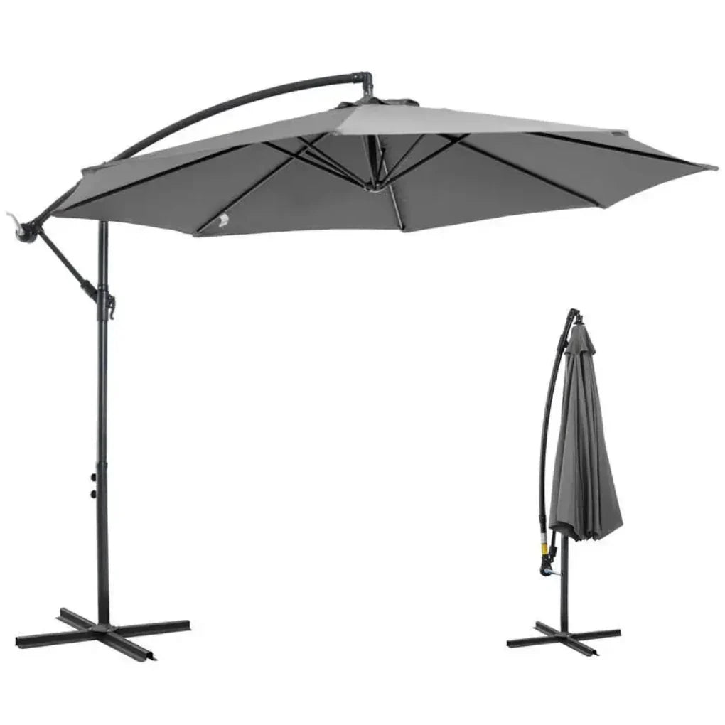 Large black outdoor patio umbrella with easy crank system, providing cool shade for garden relaxation.