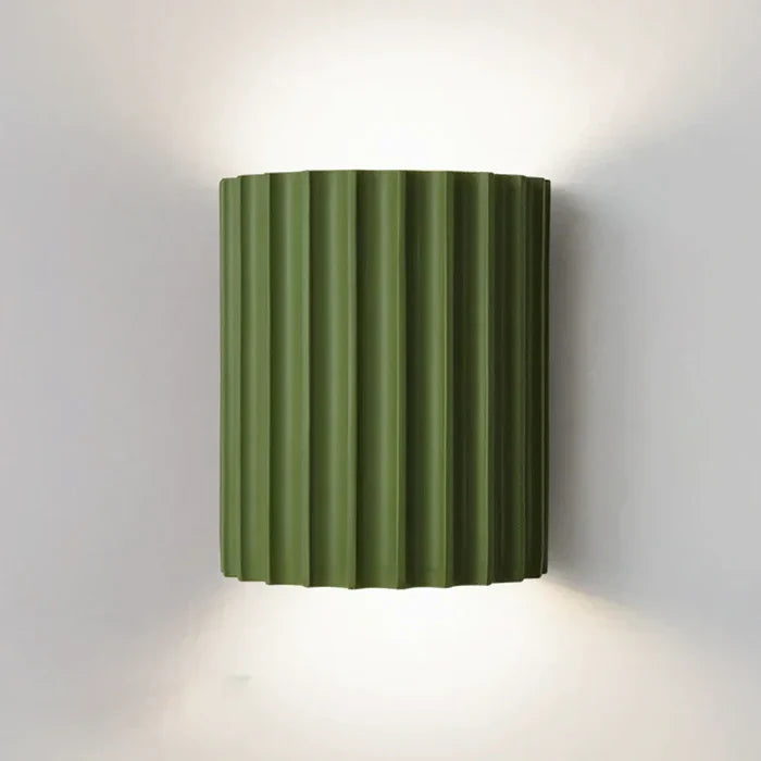 Resin wall lamp featuring a sleek, modern artistic wave design. Contemporary LED lighting fixture.