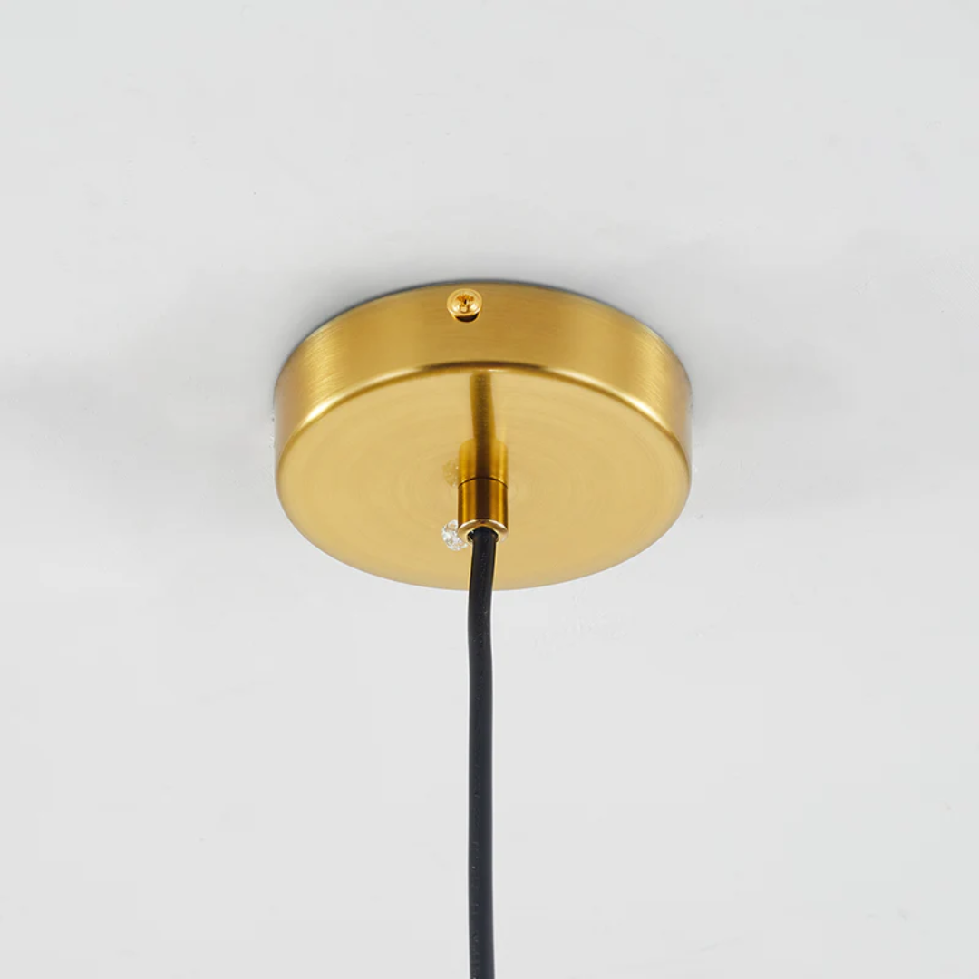 Modern spherical LED pendant light, Aurora Sphere, perfect for contemporary dining rooms.