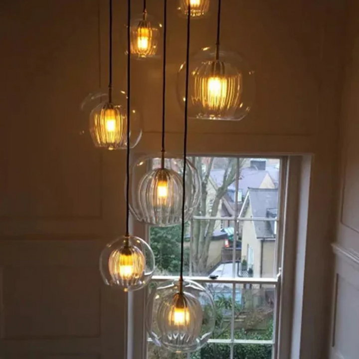 Spherical LED pendant, Aurora Sphere, modern light for elegant home interior design.