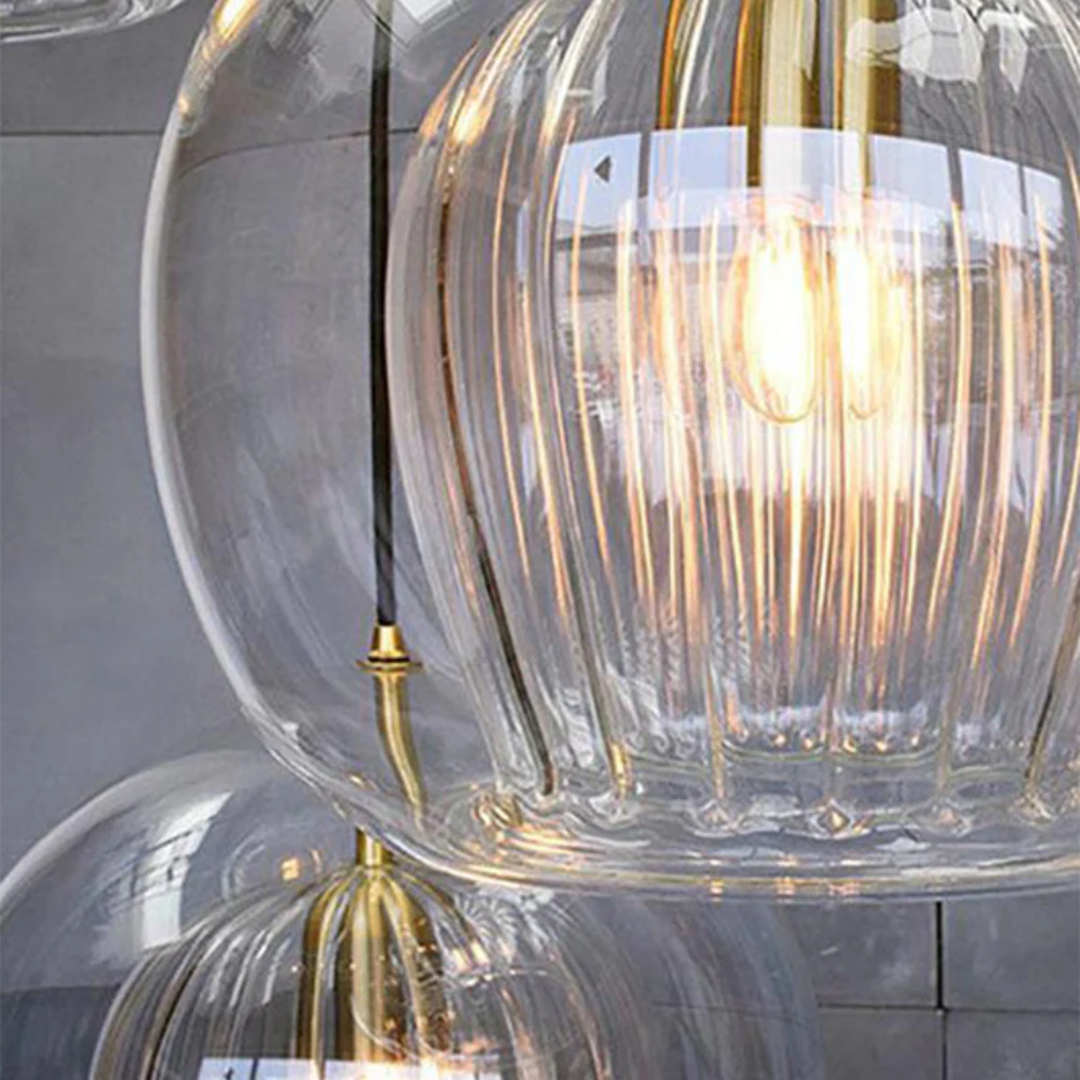 Modern Aurora Sphere LED pendant, sleek design, enhances living or bedroom decor.