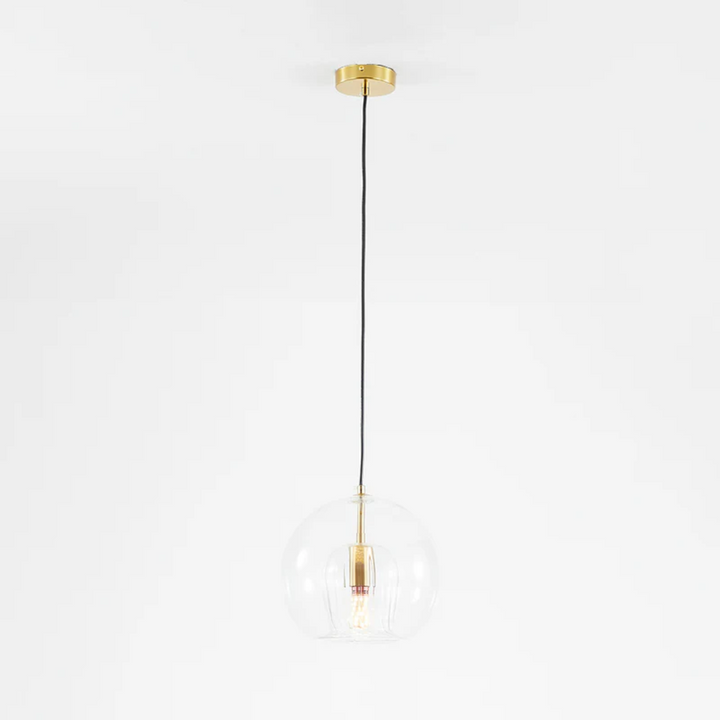Chic Aurora Sphere modern LED pendant lamp, creating warm ambient light.