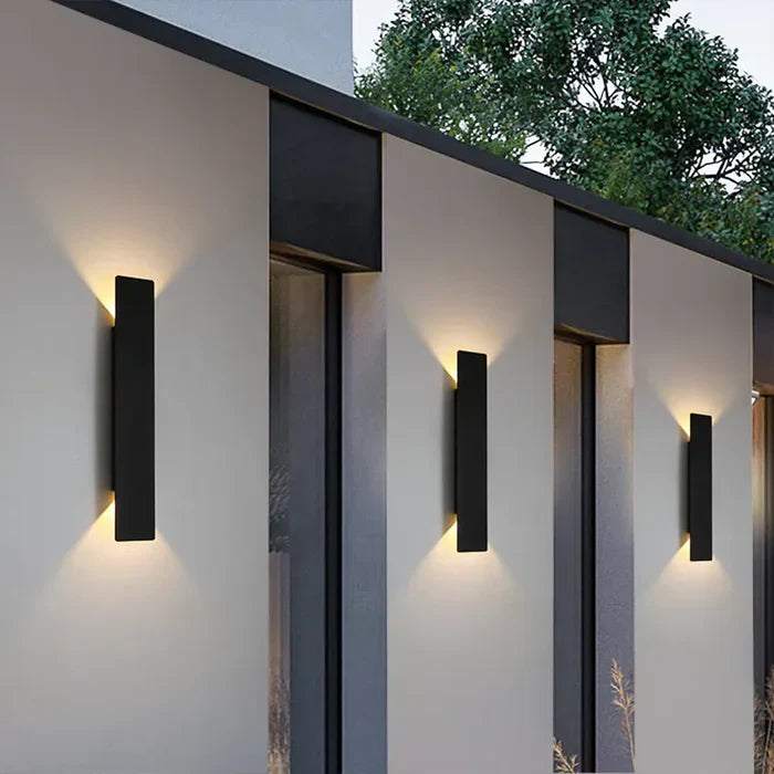 Modern StormGlow weather-resistant outdoor wall lamp for home exteriors, perfect for patios & gardens.