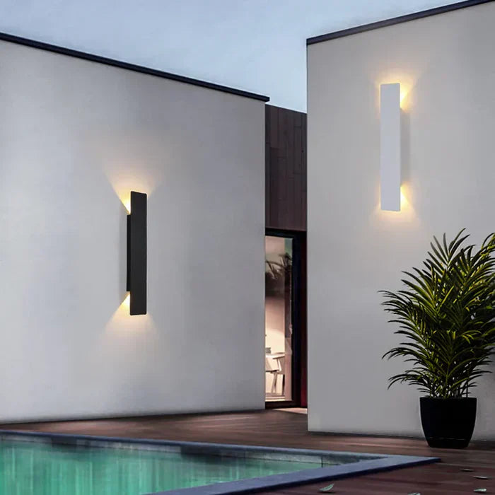 Durable StormGlow weather-resistant outdoor wall lamp enhancing modern home decor on balconies & entryways.