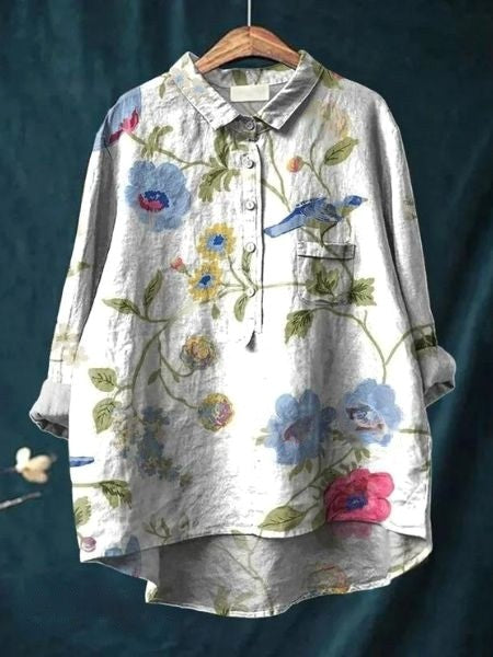 Women's vibrant floral short sleeve top, a relaxed fit for effortless summer comfort.
