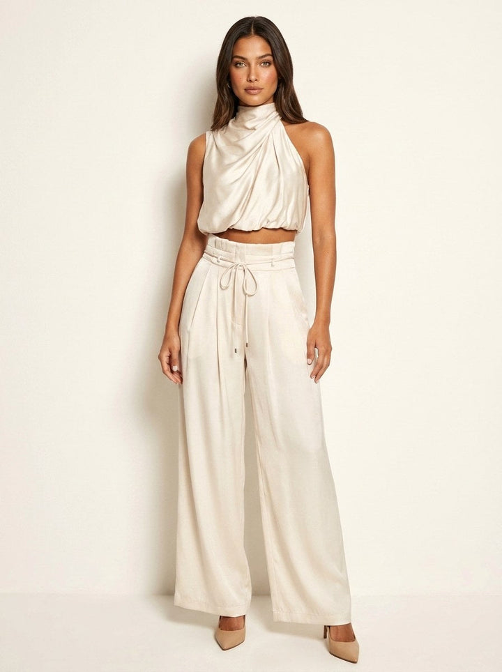 Women's formal halter neck wide-leg suit, a trendy and comfortable occasion wear ensemble.