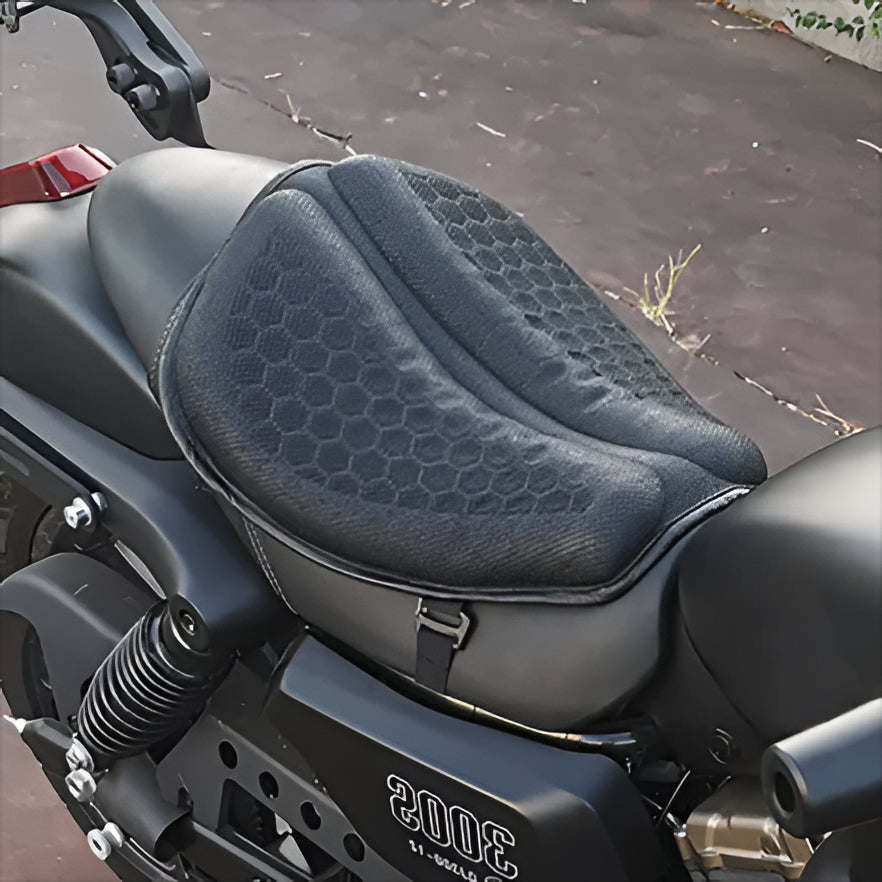 Motorcycle gel seat pad providing shock absorption and comfort for long rides. Enhance rider comfort with this anti-slip, breathable seat cushion.