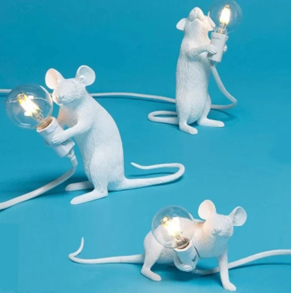 Whimsical gold mouse table lamp with white shade, unique decorative accent light for bedside, desk, or home.