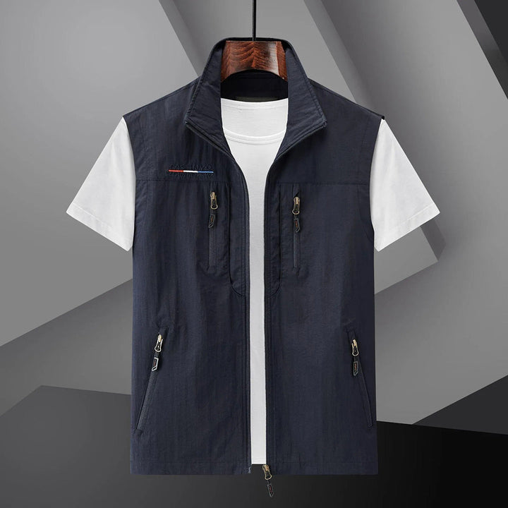 Men's multi-pocket utility vest for outdoor activities & travel. Lightweight summer fishing & hiking gear.