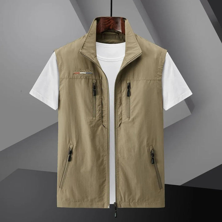 Men's casual multi-pocket vest for summer travel & outdoor adventures. Lightweight sleeveless utility gear.