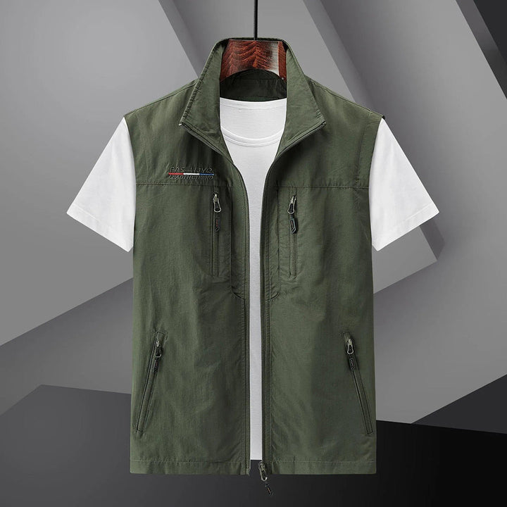 Durable men's outdoor utility vest. Lightweight, multi-pocket design for comfortable summer travel & adventure.