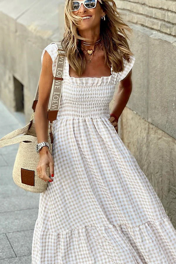 Fashionable women's classic check maxi dress, an elegant long checkered dress for sophisticated style.