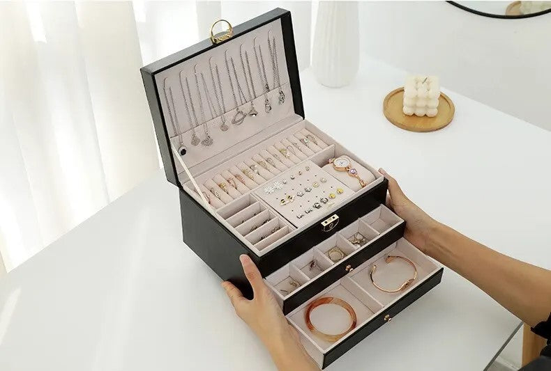 Organized and stylish dresser top storage with a luxury leather jewelry box