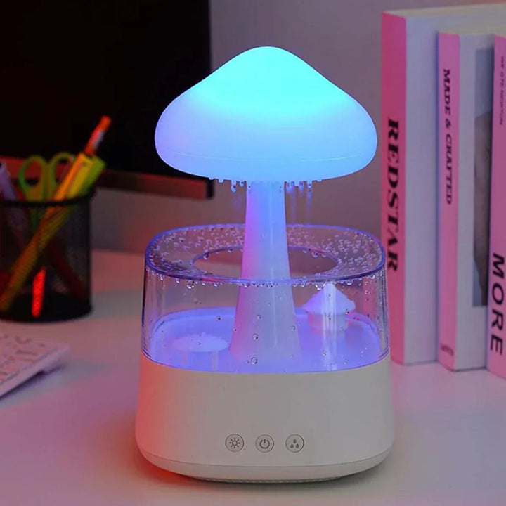 Gentle rain cloud humidifier & ambient mushroom night light for soothing aromatherapy and peaceful sleep.