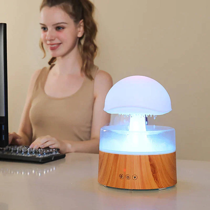 Stylish mushroom rain cloud humidifier & night light, perfect desktop decor for aromatherapy & air quality.