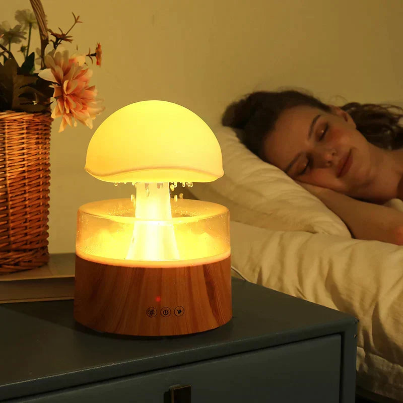 Mushroom rain cloud humidifier with soothing rain sounds & colorful LED night light for relaxation and home decor.