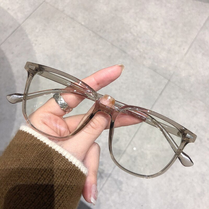 Modern square prescription glasses for myopic vision, comfortable plastic frame.