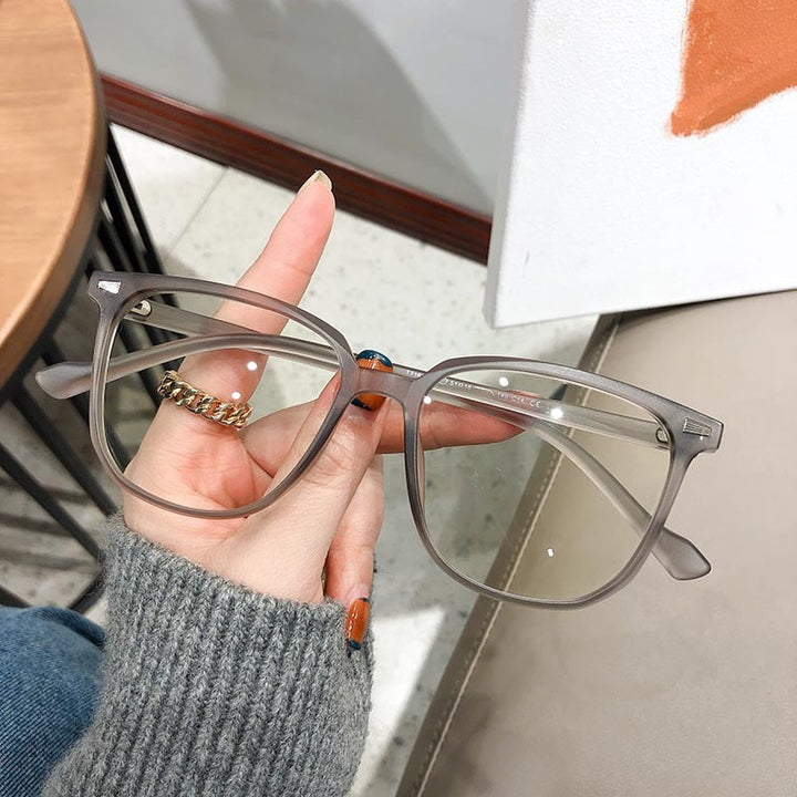 Unisex anti-blue light glasses for clear nearsighted vision, durable plastic.