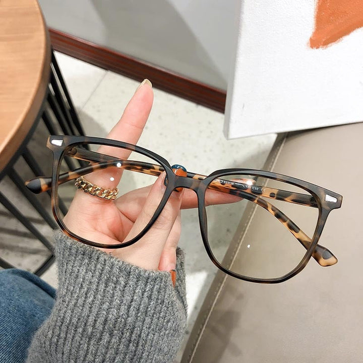 Stylish unisex prescription glasses, anti-reflective for optimal eye protection.