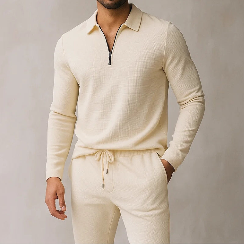Men's stylish quarter zip polo tracksuit set with comfortable jogger pants.