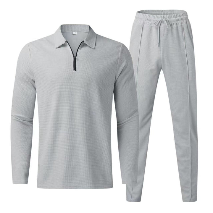 Comfortable men's loungewear tracksuit set, featuring a quarter zip polo and jogger pants.
