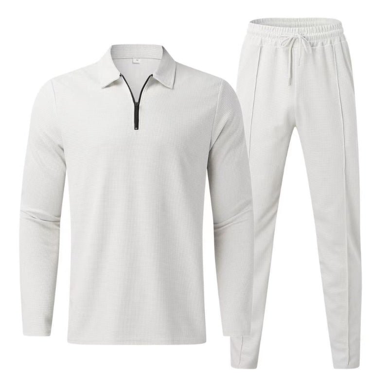 Complete men's fashion quarter zip polo and jogger pants tracksuit, offering style and comfort.