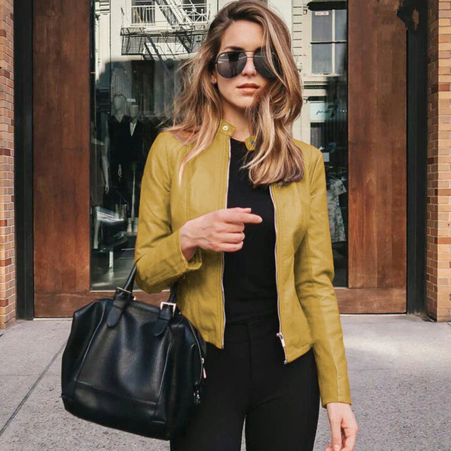 Model wearing a Naomi elegant leather jacket, highlighting its chic fit and stylish, timeless design for women's fashion.
