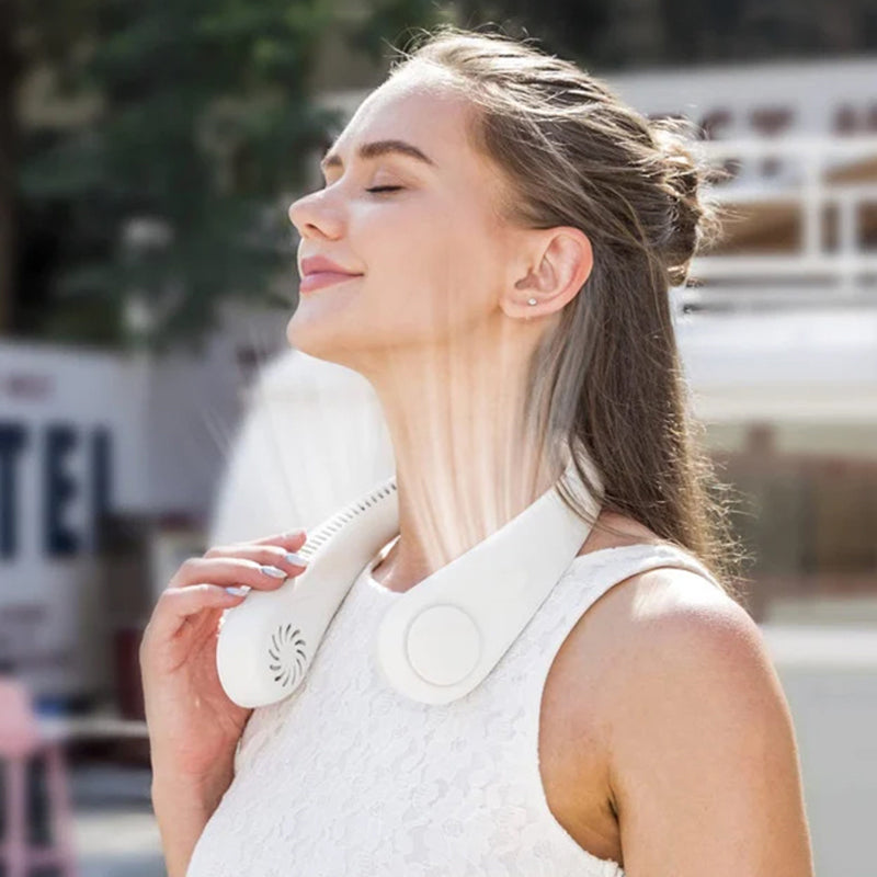 Lightweight, ergonomic neck fan provides bladeless cooling. Your ultimate portable summer essential.